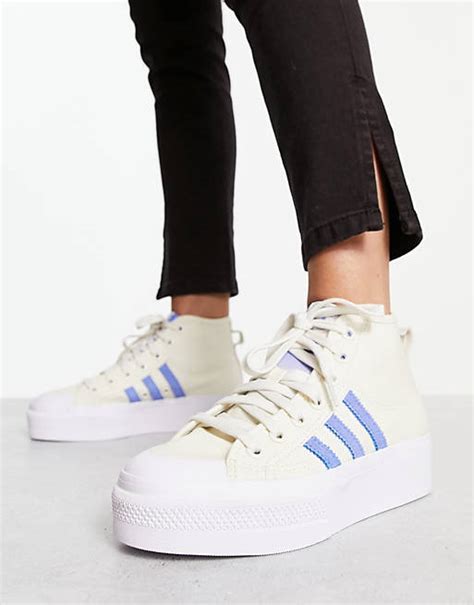 halfhoge adidas wit|white Adidas sneakers.